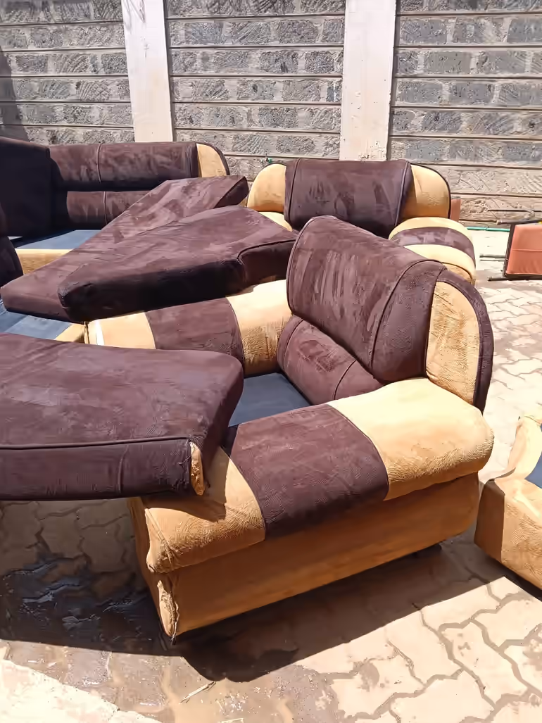Brown and beige two tone fabric sofa set drying outdoors after professional upholstery cleaning